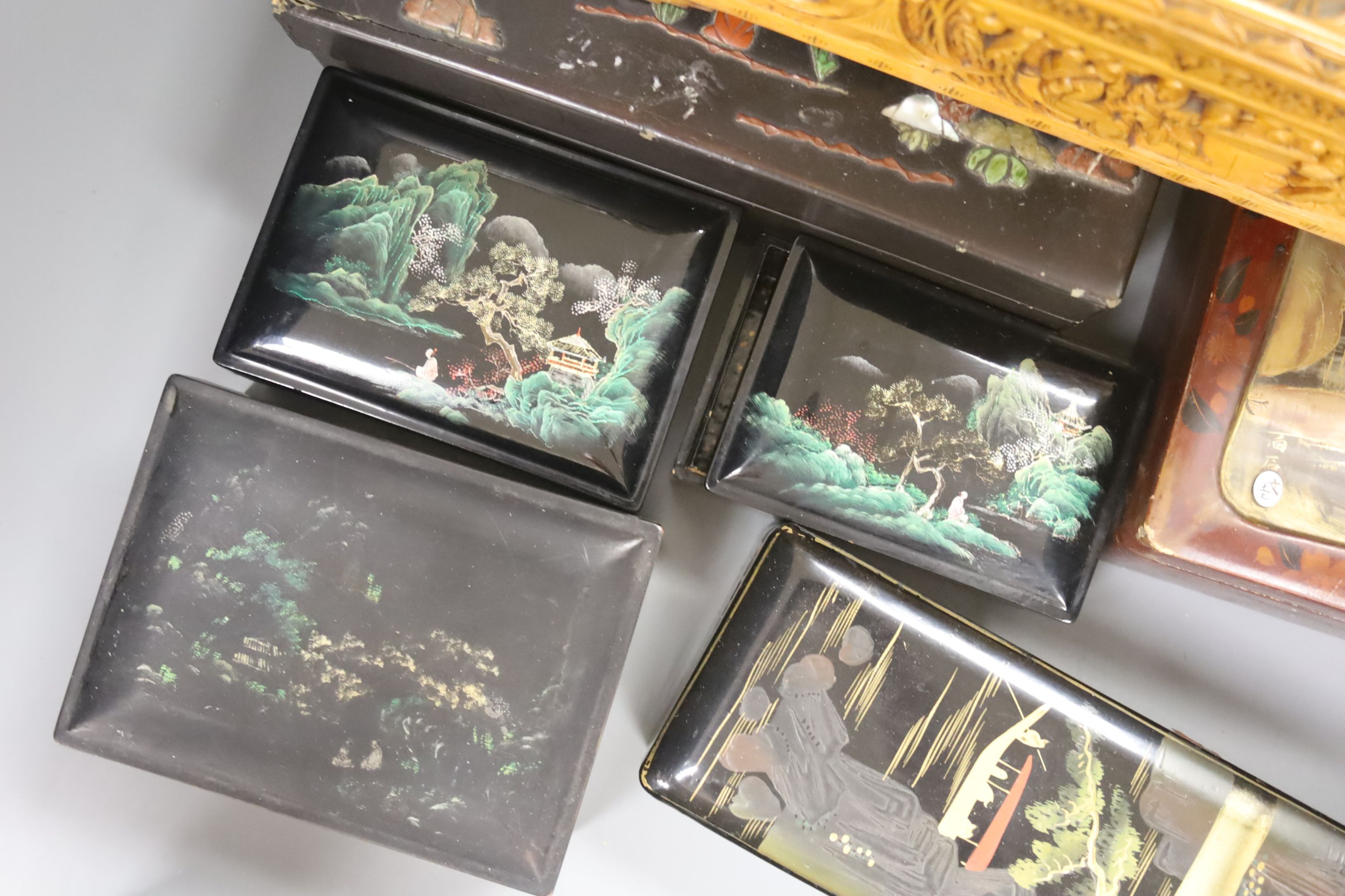 A collection of Chinese lacquered, carved hardwood and other boxes (11)